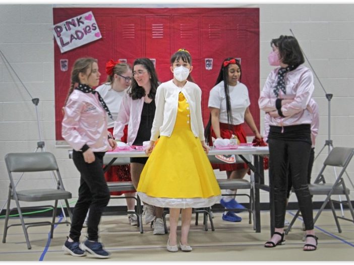 Participants performing Grease.