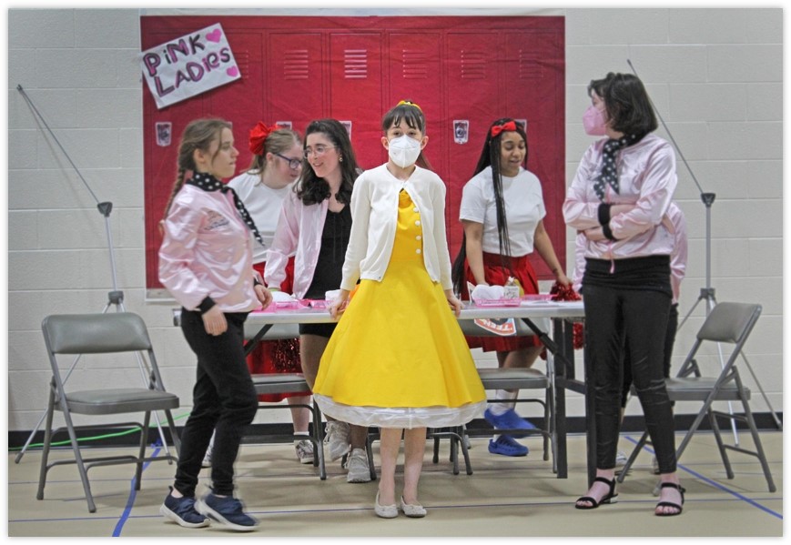 Participants performing Grease.